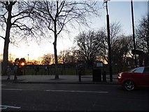 TQ2576 : Sunset over Eel Brook Common by David Howard