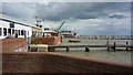 Sea Wall on riverfront with jetties, Burnham-on-Crouch