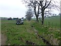 Drainage ditch and farm equipment