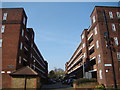 Looking through the gap between two blocks to Seven Sisters Road #2