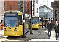 SJ8397 : Trams crossing Oxford Street by Gerald England