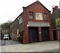 Ghost writing on a Croft Road building, Neath