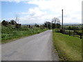 J0229 : View south eastwards along Divernagh Road by Eric Jones