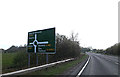 TM1478 : A143 Bungay Road & roadsign by Geographer