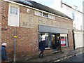 Ghost sign over the shop