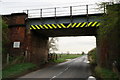 SE5919 : Rail bridge on Balne Moor Road by Ian S
