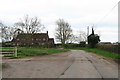 Houses on a road corner, Bleasby Moor