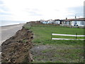 The  road  in  front  of  these  properties  has  gone