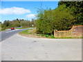 SU5846 : Roundabout at Junction 7 of the M3 seen from the entrance to Kempshott Park by Shazz