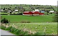 Red tin-roofed farm buildings off Seavers Road