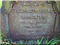 Inscription on iron cross grave marker, St Michael & All Angels Church, Beetham