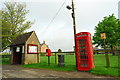 SO7216 : Phone box, letter box, bin and bus stop by John Winder