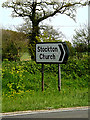 TM3993 : Stockton Church sign by Geographer
