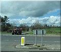 J2256 : Tractor about to join the A1 from Taughblane Road by Eric Jones