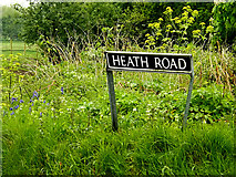 TM3992 : Heath Road sign by Geographer