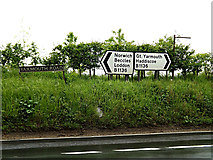 TM4197 : Roadsigns on the B1136 Yarmouth Road by Geographer