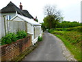 Path passes house going south towards Bradley