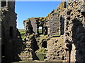 NU2521 : Dunstanburgh Castle - ruins by N Chadwick