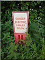 Danger electric cables below on Park Road