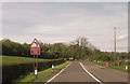 Sharp bend approaching railway bridge