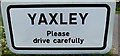 TM1274 : Yaxley Village Name sign on Eye Road by Geographer