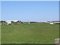 Rhosneigr Ty Hen fire station tower when sun is shining on it from near the park