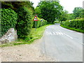 Road goes east out of West Meon