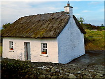 M3810 : White Thatched-Roof Cottage along west side of N67 near Dunguaire Castle by Suzanne Mischyshyn