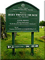 TL8646 : Holy Trinity Church sign by Geographer