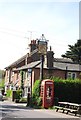 Wheatsheaf Inn sign and telephone box