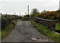 Monastery Road crosses a humpback bridge near Neath Abbey ruins