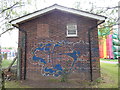 Graffiti on building in Alderman Road recreation ground