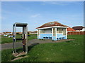 Vandalised telephone box and seafront shelter, Minnis Bay