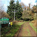 Nameboard and two warning notices at the southern entrance to Mescoed Mawr