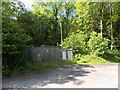 Fenced gas installation at the eastern entrance to Coed Trecastell