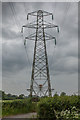 Electricity pylon and lane to Five Lanes Farm