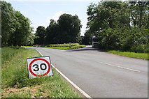 SP5725 : Temporary speed limit on B4100 at layby by Roger Templeman