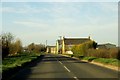 The road passes New Barn Farm