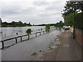 The Thames breaking its banks at Mortlake