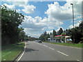 A283 passes the Esso Service Station