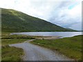 NH1053 : Track leading to the shore, Loch Sgamhain by Alpin Stewart