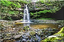 NY9028 : Gibson Cave and Summerhill Waterfall by Paul Buckingham