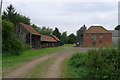 SK8857 : Outbuildings with log store at The Hall, Stapleford by Tim Heaton