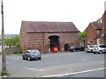 Empty Barn next to The Greyhound Inn