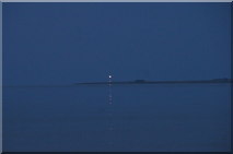 NH9487 : Tarbetness Lighthouse from Embo beach at dusk by Mike Pennington