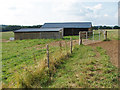 SU9346 : Cow shed near Shacklefoed by Alan Hunt