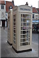 Two Cream Telephone Boxes