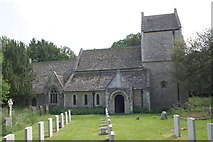 SP5825 : St Laurence's Church with gravestones by Roger Templeman