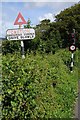 SZ4887 : Traditional road sign and traffic lights by Philip Halling