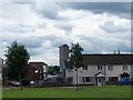 The Nationalist Divis Tower towering above the low rise housing estates of the Loyalist Lower Shankill